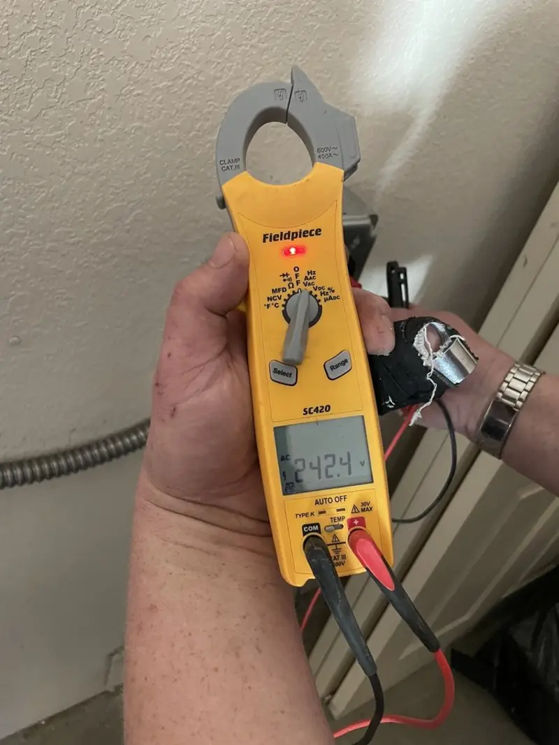 Voltage testing with clamp meter during Aluminum Wiring Replacement in Spring City